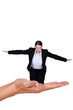 Businesswoman balancing in a hand