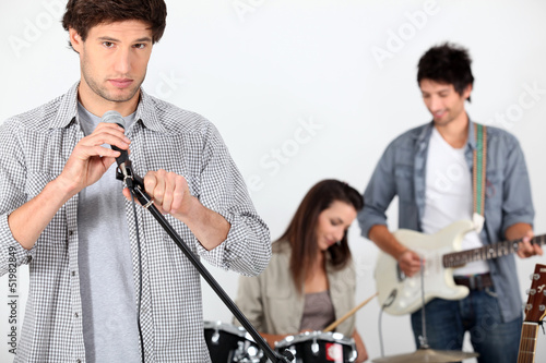 Photo: Three musicians rehearsing Three musicians rehearsing