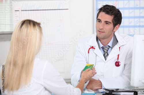 Photo: a patient and a doctor a patient and a doctor
