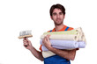 Photo: Man about to wallpaper Man about to wallpaper