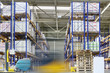 Loader machine moves in warehouse of factory