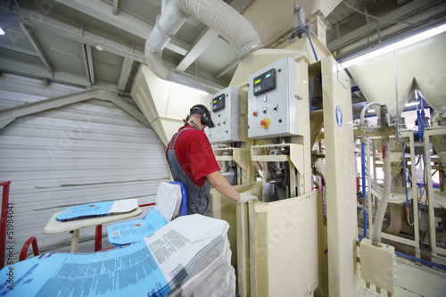 Photo: Man work at factory Man work at factory