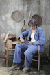 man sharpening rural tools
