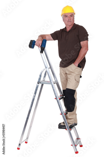 Photo: Serious man with a drill Serious man with a drill
