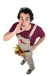 Photo: Laborer in dungarees on white background Laborer in dungarees on white background
