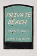 Old weathered Private beach sign