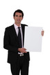 smart businessman making presentation against white background