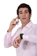 Businessman looking at the time