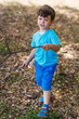 Little boy walking in the nature