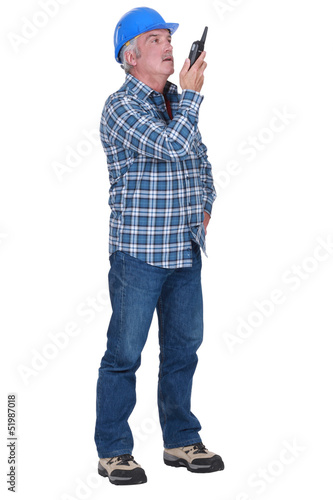 Photo: Foreman with a walkie talkie Foreman with a walkie talkie