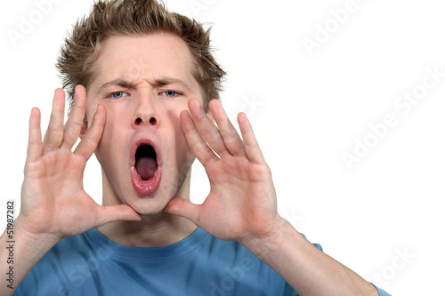 Photo: Young man shouting Young man shouting