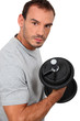 Man lifting a dumbbell
