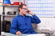 Photo: Plumber in the office Plumber in the office