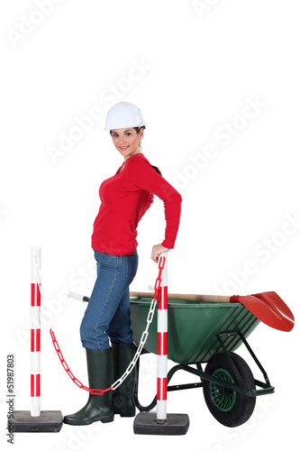 Photo: Road-side worker with wheelbarrow Road-side worker with wheelbarrow