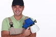 Photo: Man with a pressure sprayer Man with a pressure sprayer