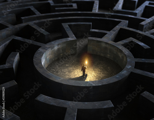 Photo: Man in the middle of a mysterious maze Man in the middle of a mysterious maze