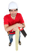 Foto: Smiling carpenter with a saw Smiling carpenter with a saw