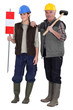 craftsman and young apprentice posing together