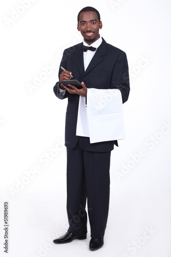Photo: Waiter taking an order Waiter taking an order