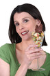 Foto: Woman with Easter eggs and chocolate hen Woman with Easter eggs and chocolate hen