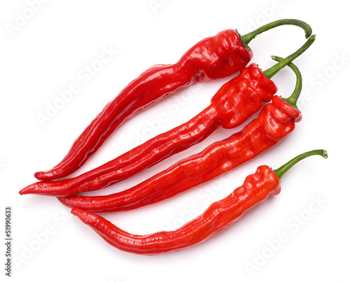 Photo: Fresh red chili peppers on white background. Fresh red chili peppers on white background.