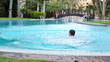 Video: Man jumping into swimming pool Man jumping into swimming pool