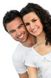 Photo: Cheerful couple in front of blue wall Cheerful couple in front of blue wall