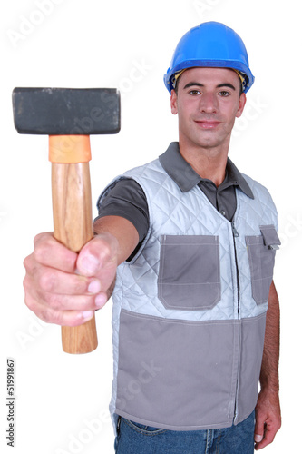 Photo: handyman showing hammer handyman showing hammer