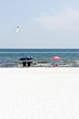 Deckchairs and umbrellas alongside the ocean