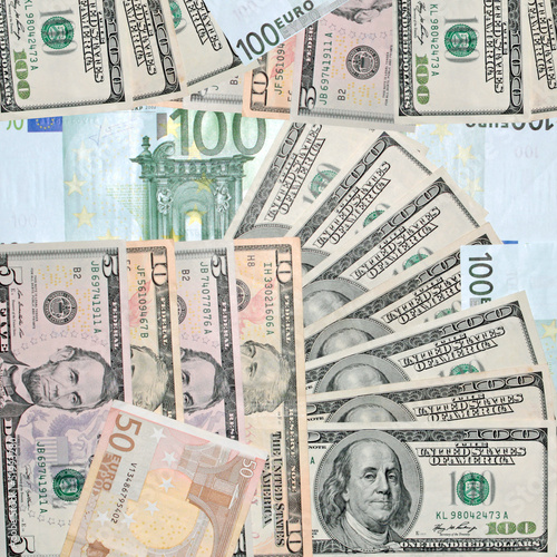 Photo: Background with dollars and euros Background with dollars and euros