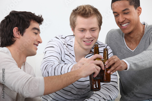 Photo: Three friends getting drunk together Three friends getting drunk together