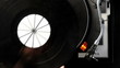 Putting vinyl disc on a turntable