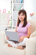 asian Chinese female online shopping with lifestyle background