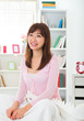 Chinese Asian girl female waking up on bed