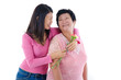 Happy Asian Chinese Mother and Daughter with carnation flower wi
