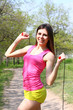 Girl posing with a skipping rope on a summer day