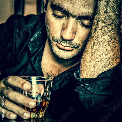 Photo: Portrait of a lonely and desperate drunk hispanic man Portrait of a lonely and desperate drunk hispanic man
