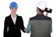 Photo: Construction manager and worker Construction manager and worker