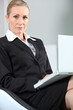 Photo: Unhappy businesswoman with laptop. Unhappy businesswoman with laptop.