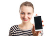 Young blond woman showing white cell phone