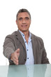 man giving his hand for a handshake