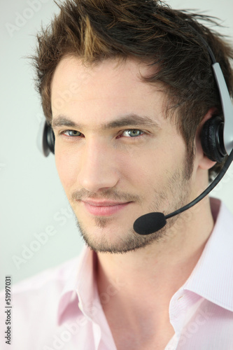 Photo: Portrait of a man with a headset Portrait of a man with a headset