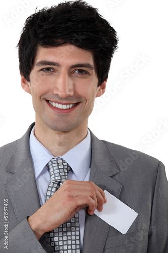 Photo: Executive with a blank businesscard Executive with a blank businesscard