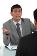 businessmen talking in the office
