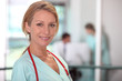 Photo: Female medic in a hospital Female medic in a hospital