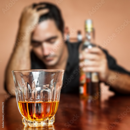 Photo: Drunk and depressed latin man Drunk and depressed latin man