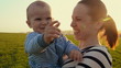 Video: happy young mother with her baby boy happy young mother with her baby boy