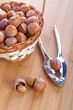 Hazelnuts with nutcracker in the basket