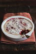 Homemade assorted berries clafoutis with icing sugar