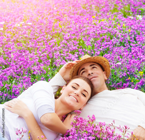 Photo: Young family on floral glade Young family on floral glade